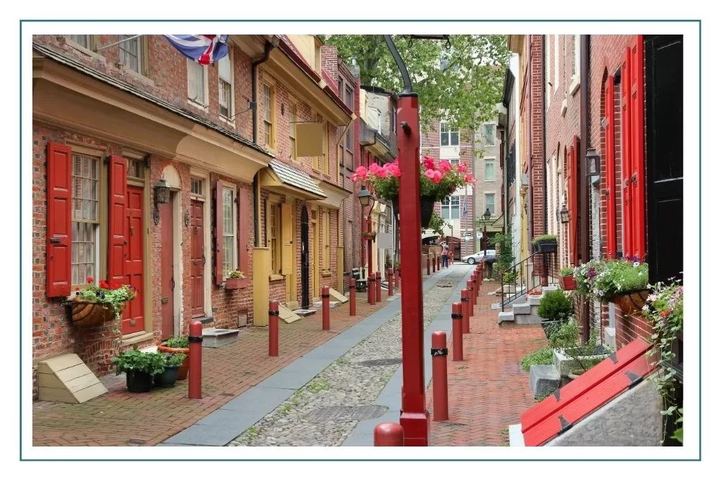 A narrow cobblestone road in Philadelphia lined with homes dating back to the 18th century.