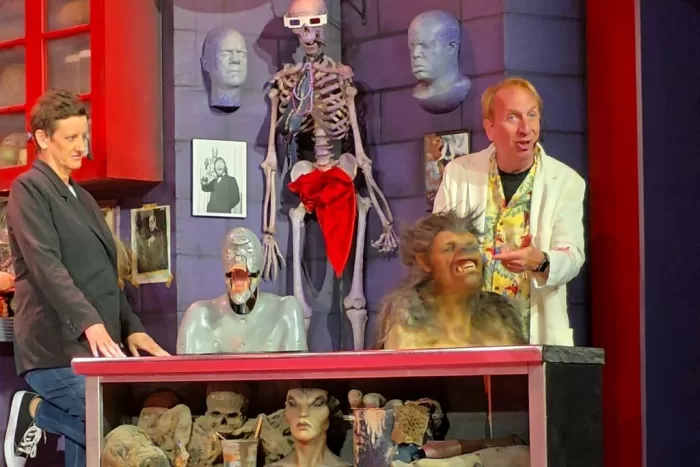 Performers on stage with props in the Universal Studios Horror Make-Up Show