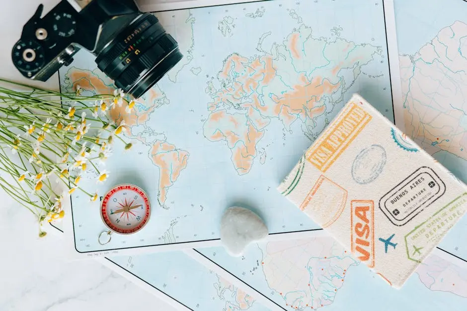 World Map with a compass and binoculars