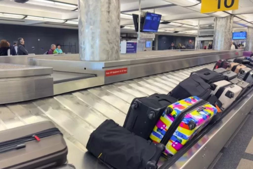 Bags going around a baggage carousel at Denver International Airport